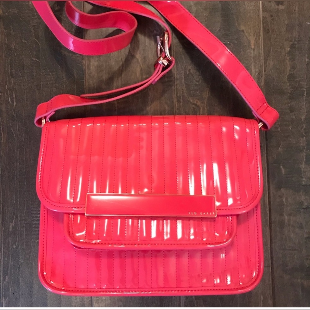 A NWOT beautiful patent leather cross body Ted Baker bag
